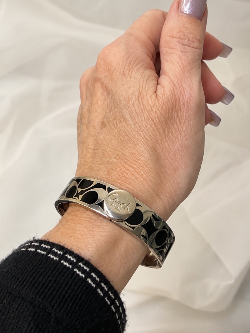 Coach Silver-Tone Cuff Bracelet with Black Logo Inlay